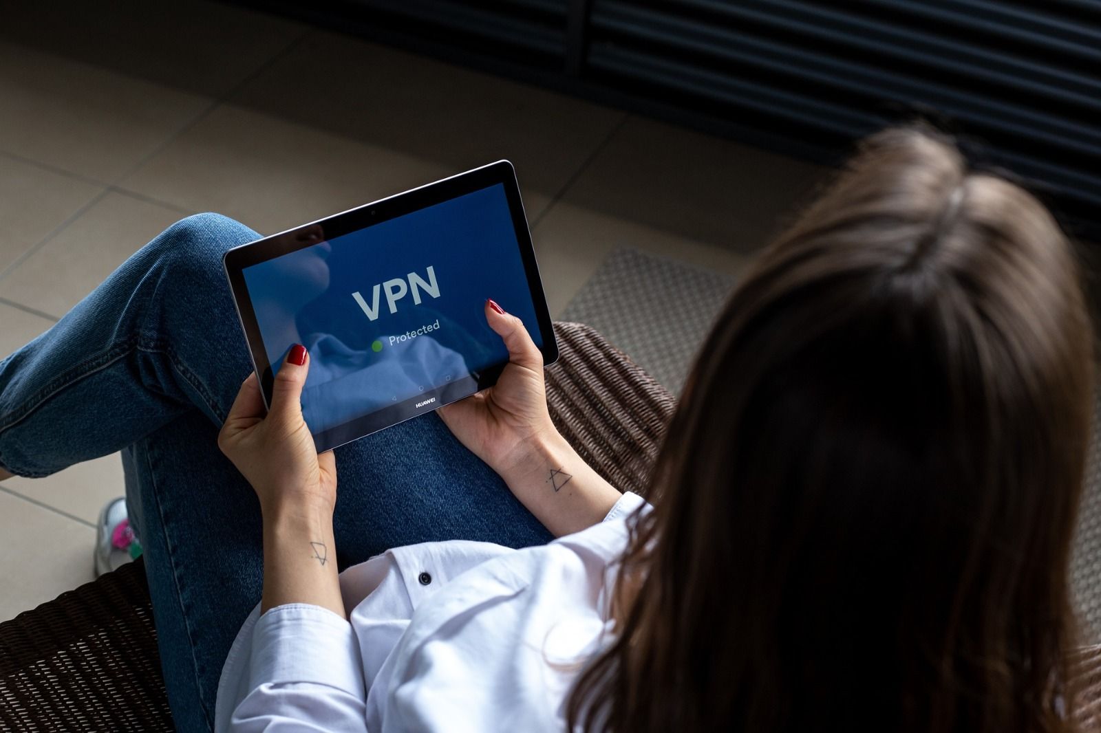 User using an iPad with VPN