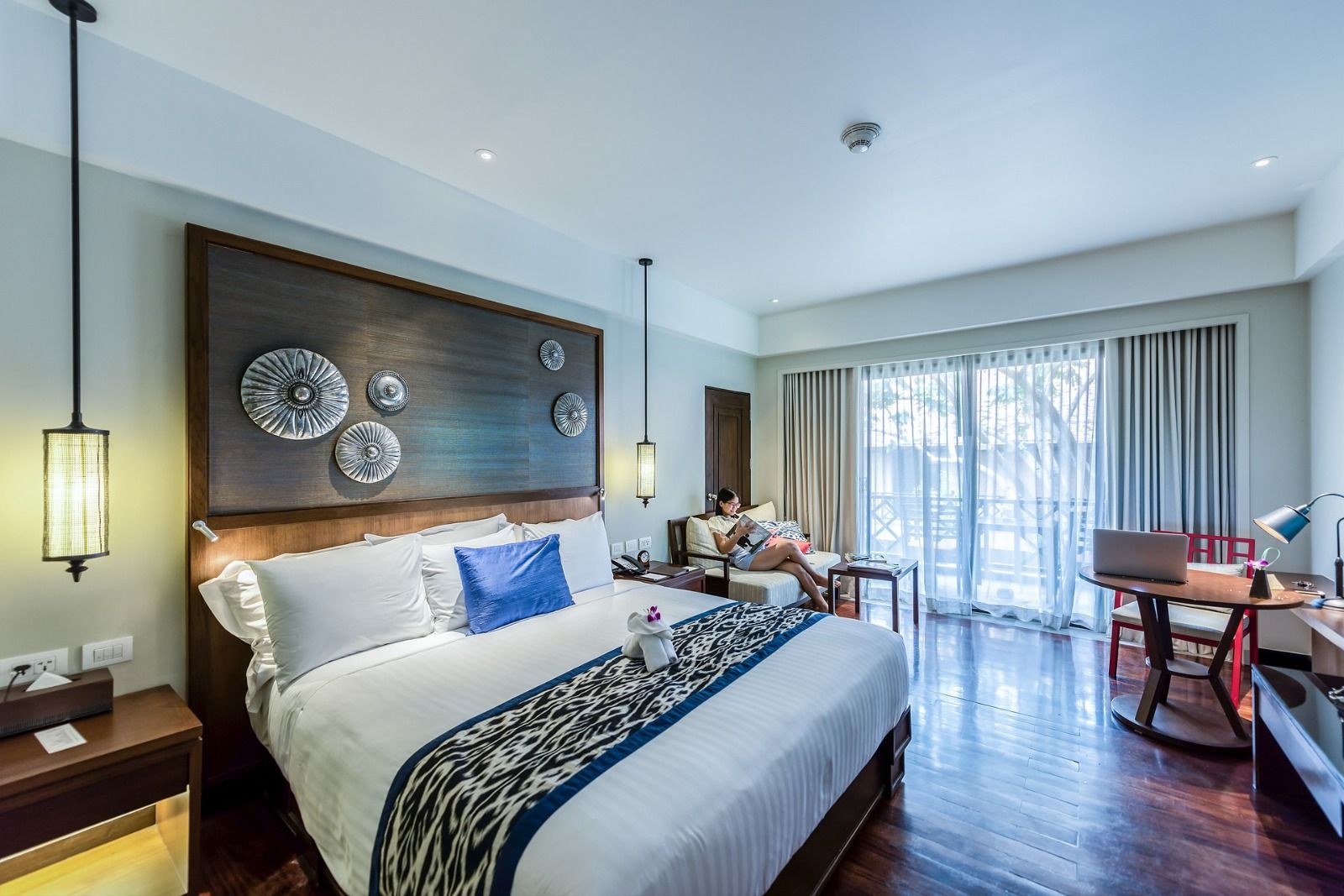 Picture of a bedroom with open windows